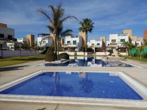 Three-bedroom holiday villa with magnificent pool next to the sea and golf courses