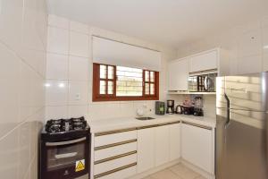 Refúgio aconchegante entre o mar e natureza N1804