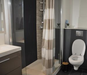 Appartements Le 64 Appartement cosy et calme en Centre-ville : photos des chambres