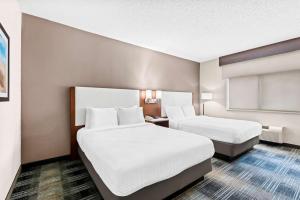 Queen Room with Two Queen Beds room in SureStay Plus Hotel by Best Western Ottumwa