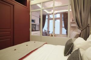 Appartements Palais Royal ChicSuites : photos des chambres