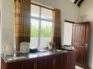 Breezy Brand-New Green Tops Villa