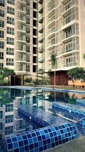 Top Floor Luxury Corner 1BR plus Den Suite with Skyline Views Megaworld Iloilo Business Park