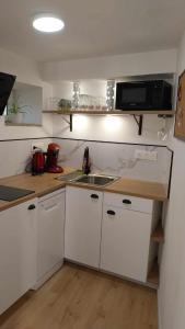 Maisons de vacances Le Scailleteux, petite maison de mineur, climatisee non accessible PMR : photos des chambres