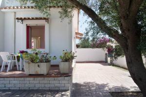 Villa Antonella con Piscina nel Boomerang Village a Torre Colimena