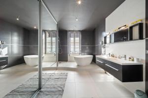Appartements Chez Flo - Appartement Luxueux - Hypercentre : photos des chambres