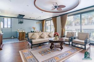 Luxe Paradise Suites Dang Thai Mai