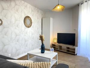 Appartements Le Brennou- Proche centre- Neuf-climatise-tout equipe : photos des chambres