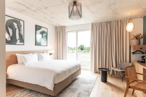 Hotels voco Beaune , Cite des Vins by IHG : Chambre Lit King-Size Super Standard avec Balcon