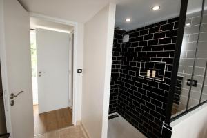 B&B / Chambres d'hotes La Villa Mirabelle 2min d'Arromanches-les-Bains : photos des chambres