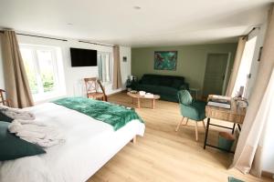 B&B / Chambres d'hotes La Villa Mirabelle 2min d'Arromanches-les-Bains : photos des chambres