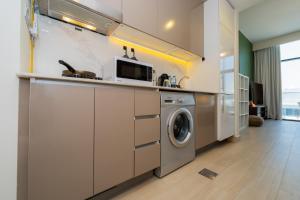 Elite Escape - 1 BHK Getaway in Azizi Riviera