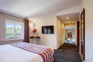 Hotels Auberge Du Roua : photos des chambres