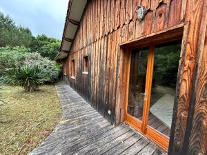 Maisons de vacances Maison agreable et ecologique a sept kilometres de l- ocean : photos des chambres