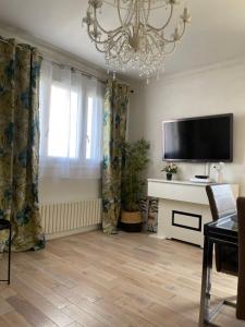 Appartements Tres joli appartement mignon confortable a Paris Villeneuve-la-Garenne : photos des chambres