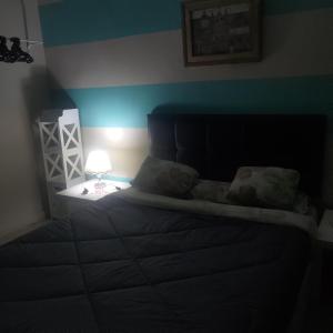 Cairo Gem budget room with AC and smart TV, 12minutes from the airport please only book through booking we cant offer booking outside the app, please contact us via phone number provided after confirming your booking, so we can check you in, thanks