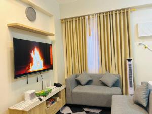 Jasrich Suite Behind SM trece martires HOPE RESIDENCES SMDC