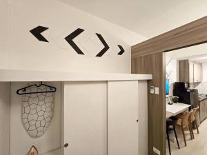 1BR Condotel with Balcony at FAME Residences #FM40