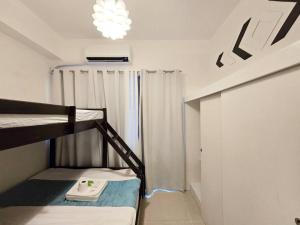 1BR Condotel with Balcony at FAME Residences #FM40