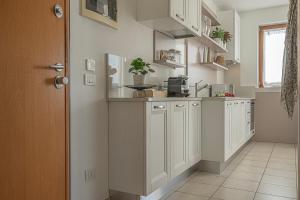 Appartamento con terrazzo e scorcio sul Lago
