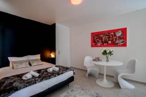 Appartements Kusmi Love piscine proche du lac : photos des chambres