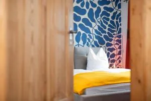 Bunter Hund Apartments - Zentrales Apartment, Parkplatz, Wintergarten, Kinderzimmer - Adelshofen