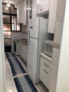 Apartamento, pé na areia Ocian Praia Grande, SP