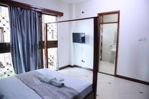 LN NYALI FULLy FURNISHED FOUR BEDROOM WITH SWIMMING