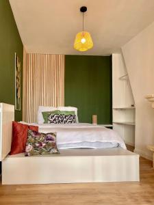 Appartements Appartement Tropical : photos des chambres
