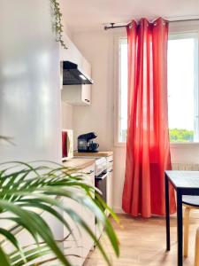 Appartements Appartement Tropical : photos des chambres