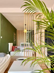 Appartements Appartement Tropical : photos des chambres