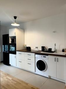 3 pièces tout neuf de haut standing à 10mn de Paris avec terrasse vue Sacré Coeur