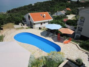 Gemütliche Ferienwohnung mit Grill und gemeinschaftlichem Pool 