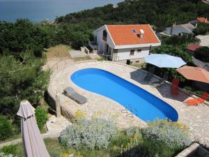 Gemütliche Ferienwohnung mit Grill und gemeinschaftlichem Pool 
