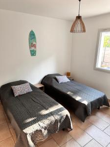 Maisons de vacances Maison face au lac : photos des chambres