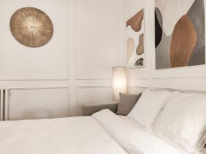 Centre-ville donnant sur cours végétalisée