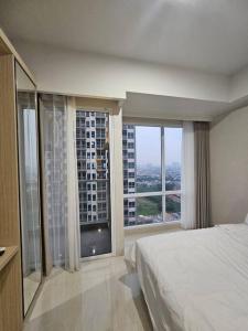 Green Sedayu Apartment Suite by Ellison