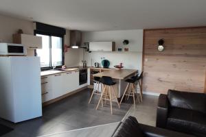 Appartements location appartement confort a 6km de la plage : photos des chambres