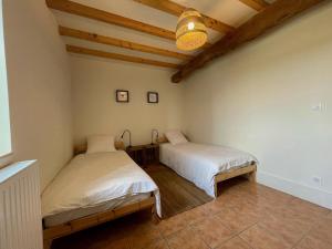 Maisons de vacances La Grange de l'ecolieu du Turc - Piscine partagee : photos des chambres