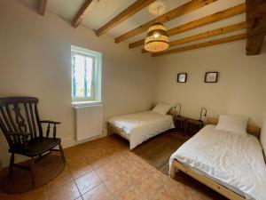 Maisons de vacances La Grange de l'ecolieu du Turc - Piscine partagee : photos des chambres