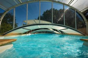 Maisons de vacances La Grange de l'ecolieu du Turc - Piscine partagee : photos des chambres