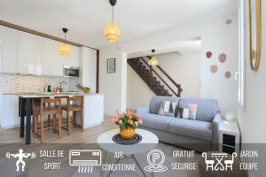Appartements L'Ethnique 7p - Climatisation - Jardin - Parking - Salle de Sport : photos des chambres