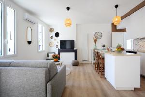 Appartements L'Ethnique 7p - Climatisation - Jardin - Parking - Salle de Sport : photos des chambres