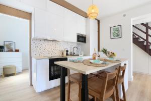Appartements L'Ethnique 7p - Climatisation - Jardin - Parking - Salle de Sport : photos des chambres