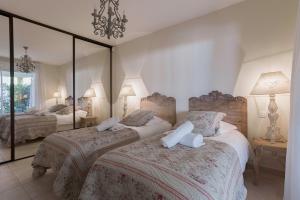 Appartements Villa Mimosa - Piscine, tennis, terrasse vue mer, clim, wifi : photos des chambres