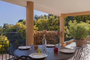 Appartements Villa Mimosa - Piscine, tennis, terrasse vue mer, clim, wifi : photos des chambres