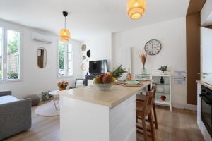 Appartements L'Ethnique 7p - Climatisation - Jardin - Parking - Salle de Sport : photos des chambres