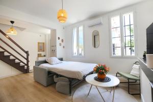 Appartements L'Ethnique 7p - Climatisation - Jardin - Parking - Salle de Sport : photos des chambres