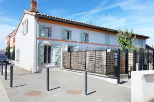 Appartements L'Ethnique 7p - Climatisation - Jardin - Parking - Salle de Sport : photos des chambres