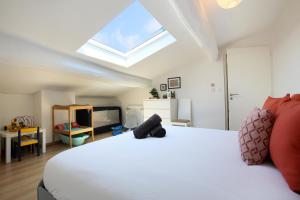 Appartements L'Ethnique 7p - Climatisation - Jardin - Parking - Salle de Sport : photos des chambres